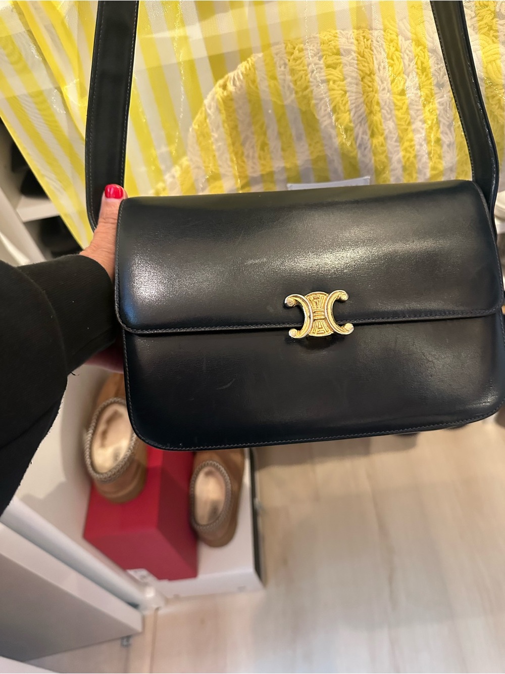 Classic Black Leather Shoulder Bag with Gold Accent